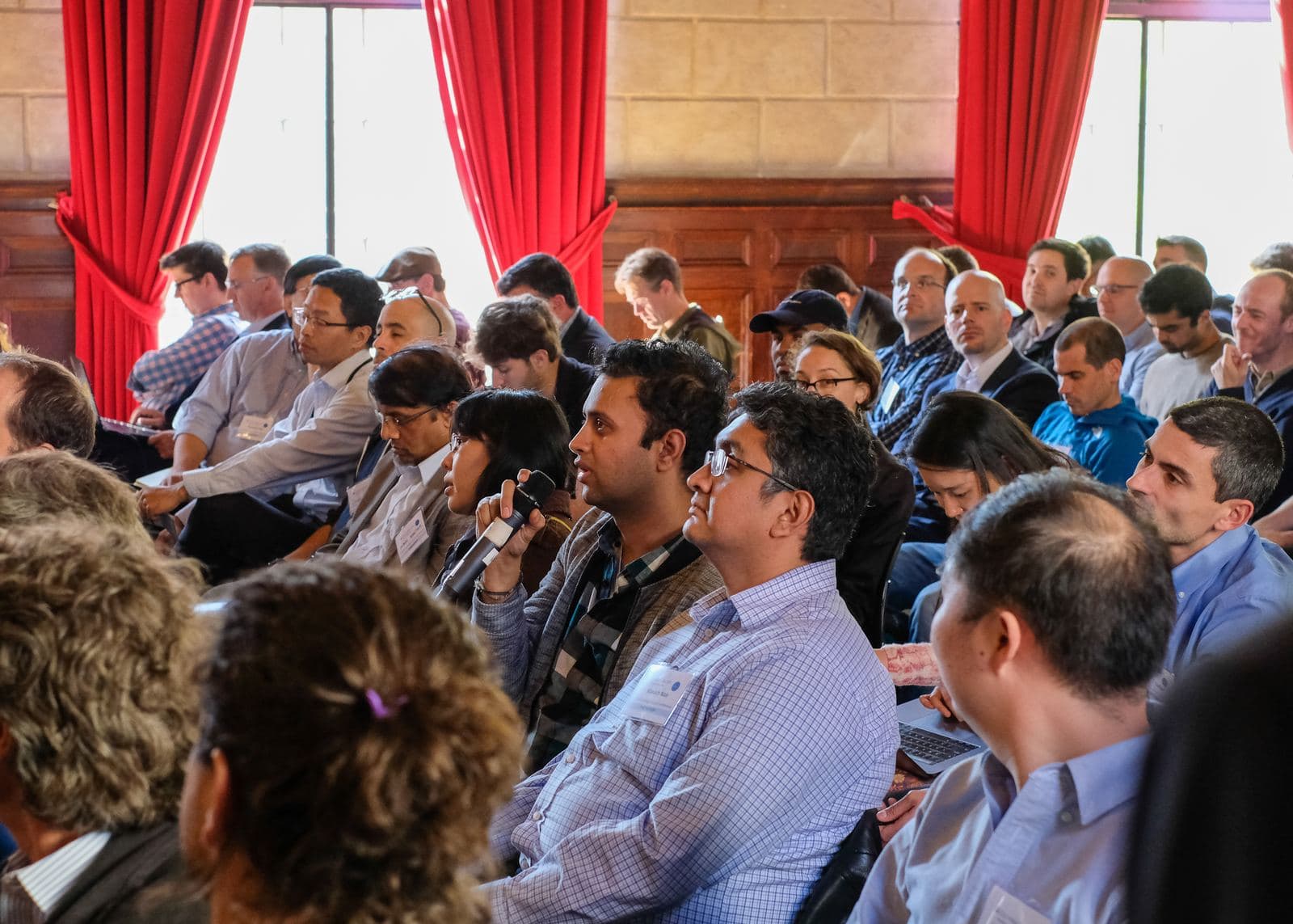 A seated audience following a talk at KGC 2022