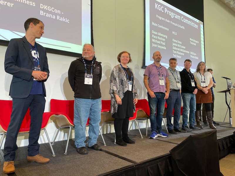 The KGC Program Committee stands on stage at the Knowledge Graph Conference 2025